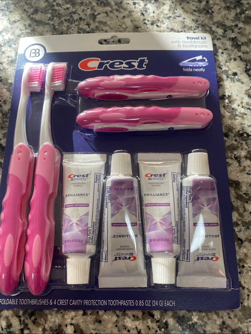 Crest Pink Foldable Toothbrush & Travel Toothpaste Pack